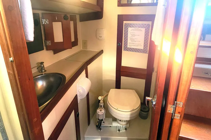 Fidelity Yacht Photos Pics Compact bathroom in 2010 Valiant 42 CE/SE yacht with sink and toilet.