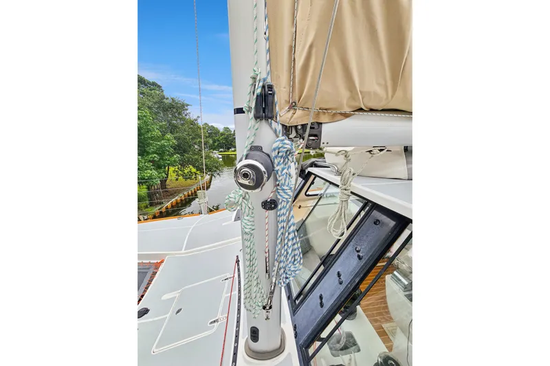 Surfer Girl Yacht Photos Pics 2018 Maine Cat 38 LS sailboat mast with rigging and ropes on deck.