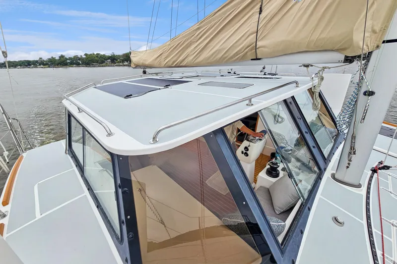 Surfer Girl Yacht Photos Pics 2018 Maine Cat 38 LS sailboat with sleek design and spacious cockpit.
