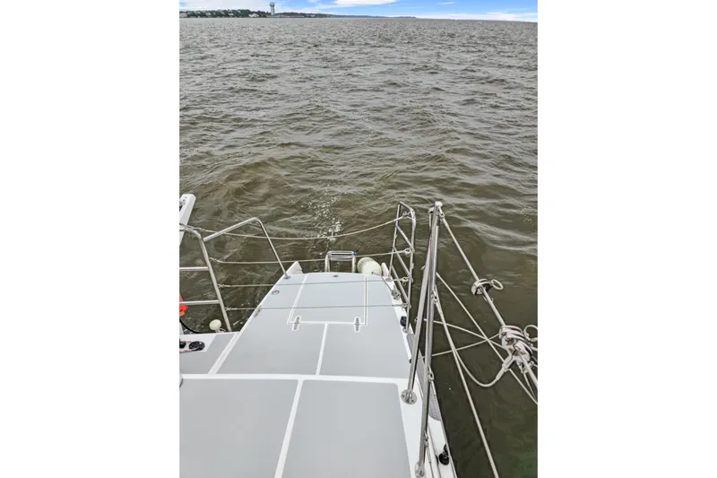 Surfer Girl Yacht Photos Pics 2018 Maine Cat 38 LS sailing on open water, view from deck.