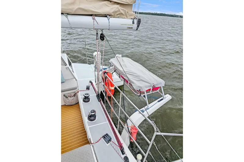 Surfer Girl Yacht Photos Pics 2018 Maine Cat 38 LS sailboat deck with winches and safety equipment on water.