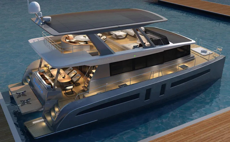  Yacht Photos Pics 2024 Mazarin 55 Catamaran Hybrid, luxury yacht with modern design, docked at marina.