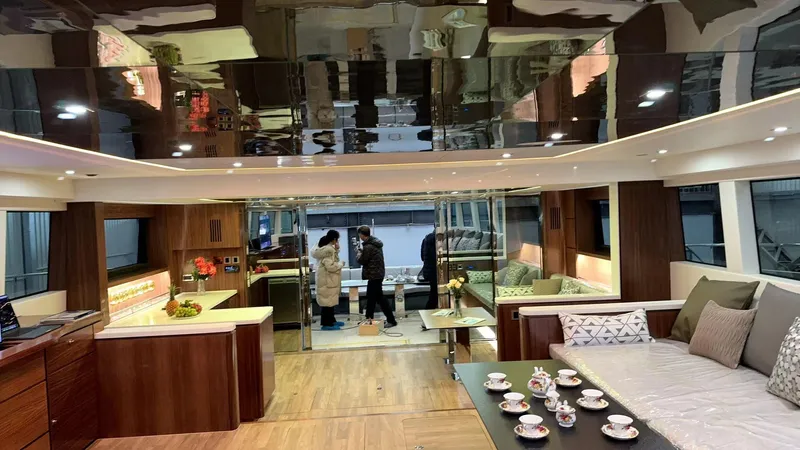  Yacht Photos Pics Luxurious interior of 2024 Mazarin 55 Catamaran Hybrid with modern furnishings and elegant design.