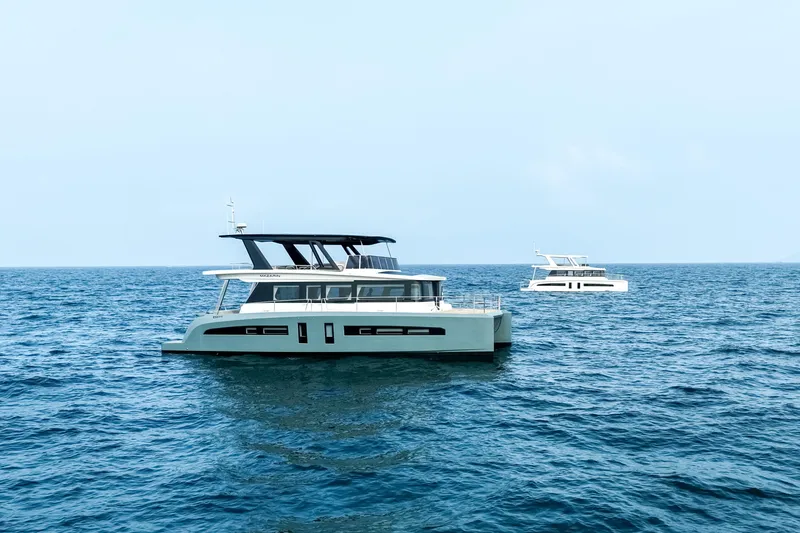  Yacht Photos Pics 2024 Mazarin 55 Catamaran EVO II Serial Hybrid cruising on open sea.