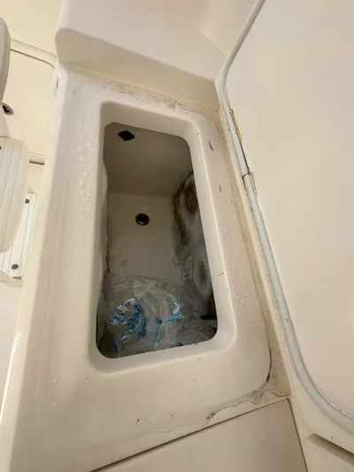  Yacht Photos Pics Storage compartment on a 2003 Riviera 40 Convertible boat.