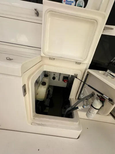  Yacht Photos Pics Engine compartment of a 2003 Riviera 40 Convertible yacht with open access panel.