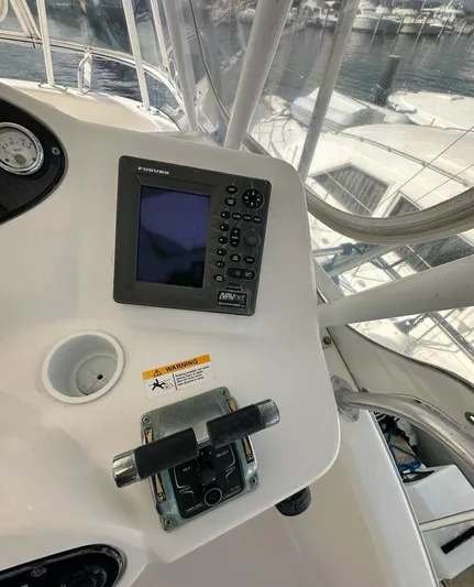  Yacht Photos Pics Control panel of a 2003 Riviera 40 Convertible yacht with navigation equipment.