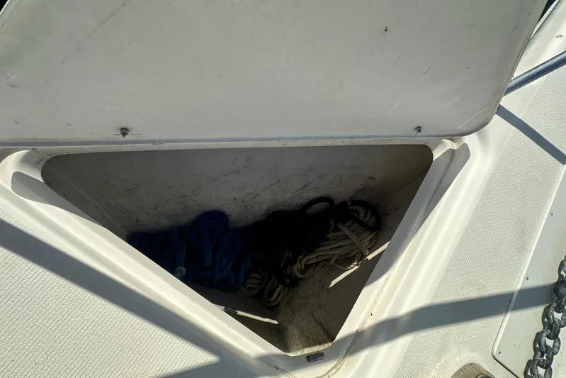  Yacht Photos Pics Storage compartment with ropes on a 2003 Riviera 40 Convertible boat.