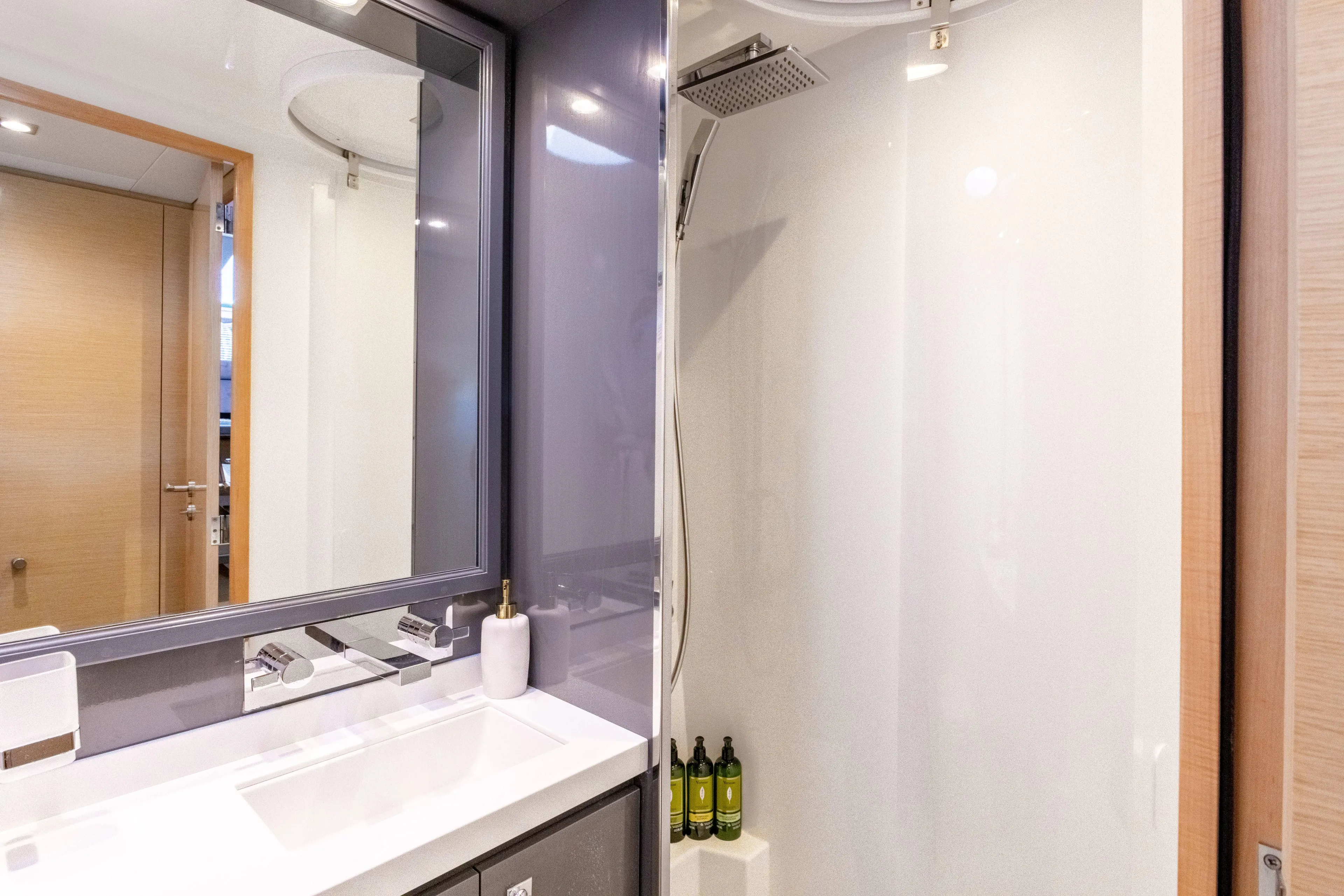  Yacht Photos Pics Modern bathroom in 2017 Fountaine Pajot Victoria 67 yacht with sleek shower and vanity.