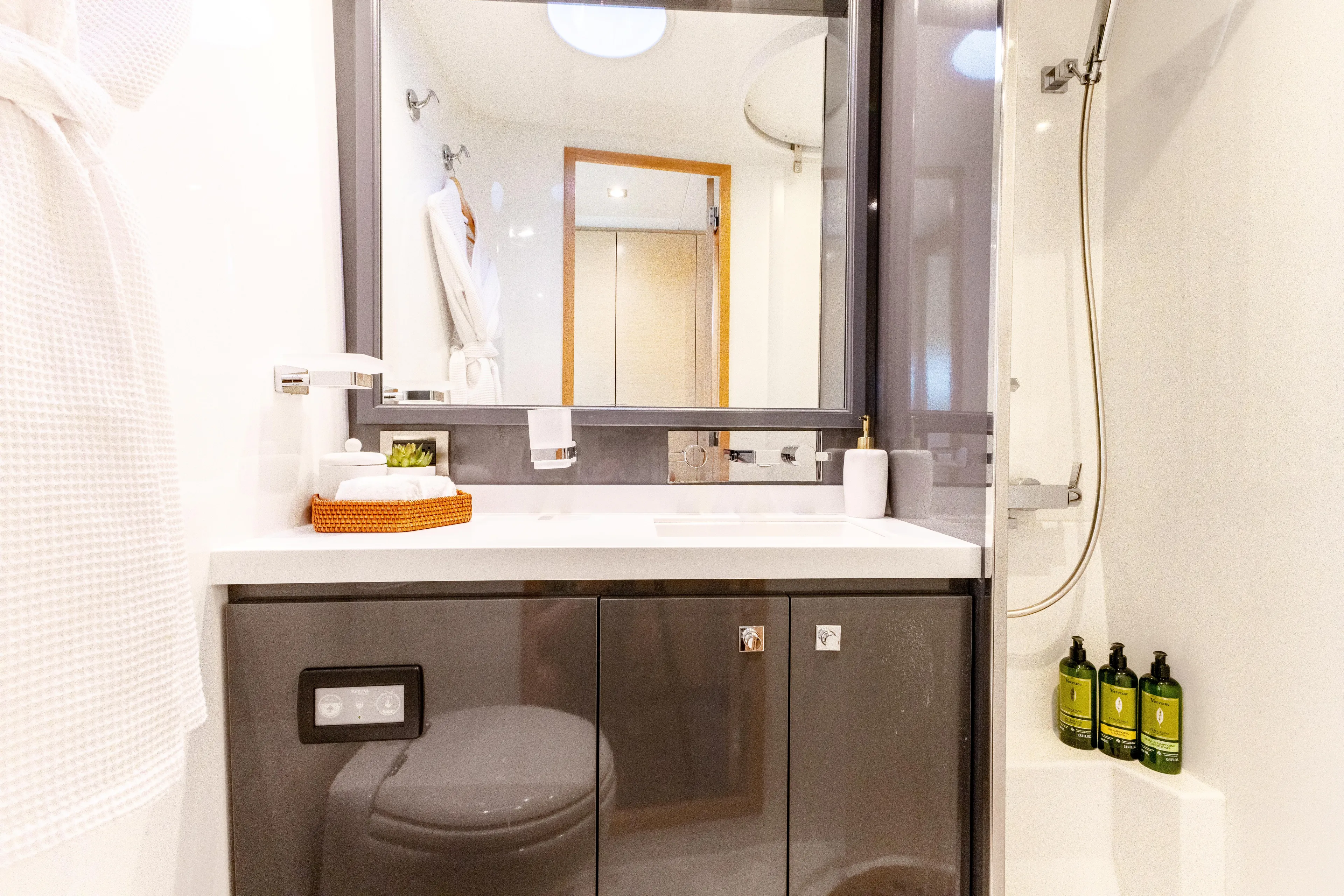  Yacht Photos Pics Luxurious bathroom in 2017 Fountaine Pajot Victoria 67 yacht with modern fixtures and amenities.