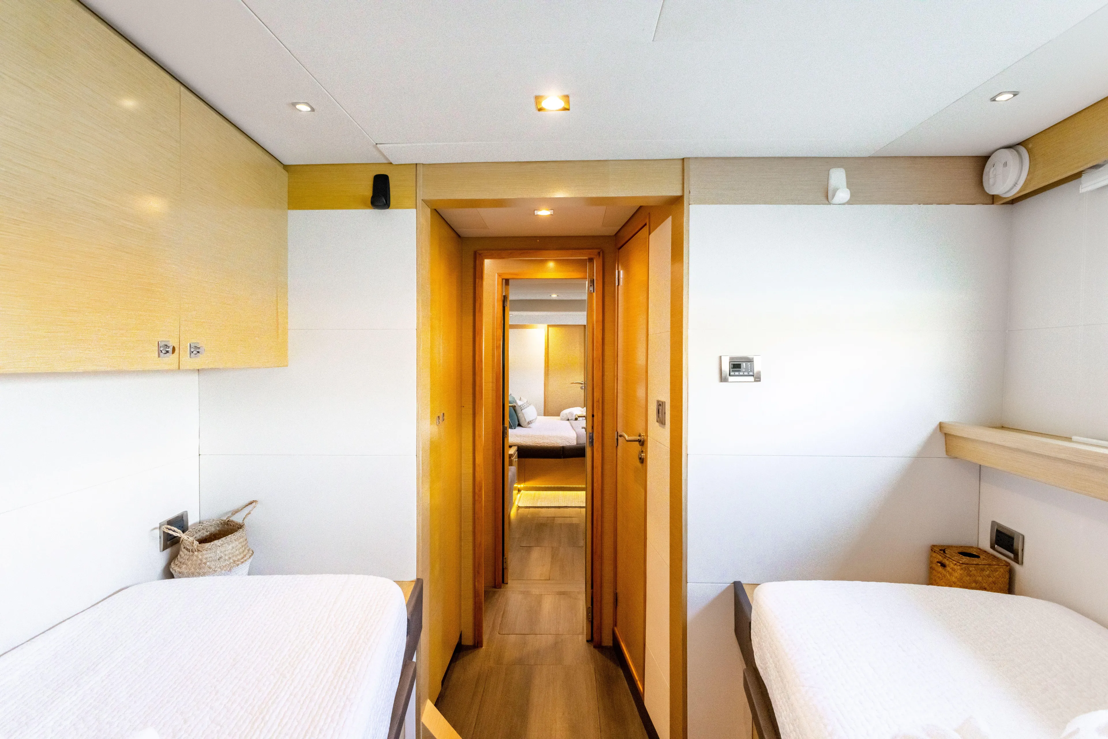  Yacht Photos Pics Luxurious interior of 2017 Fountaine Pajot Victoria 67 yacht cabin with twin beds.