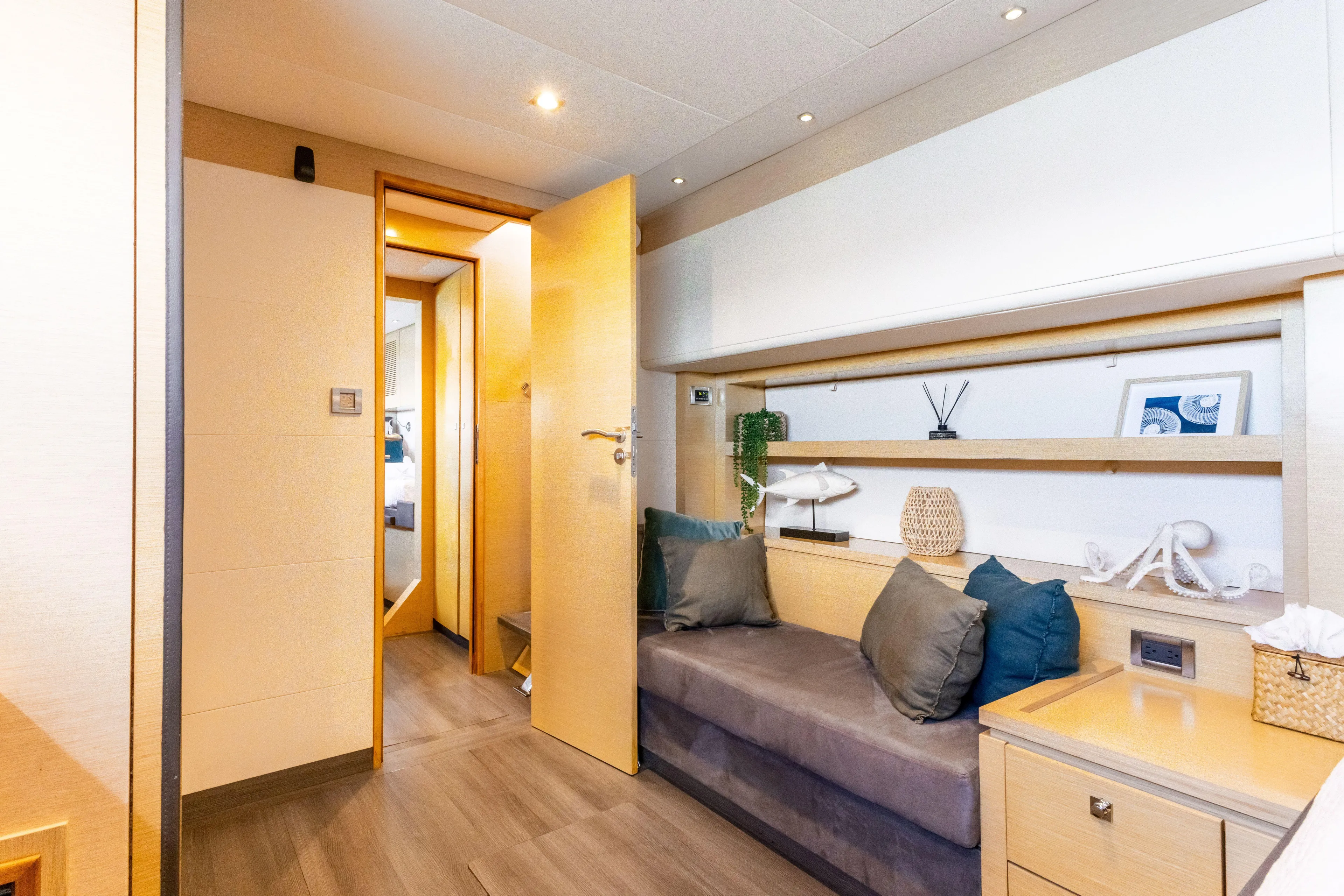  Yacht Photos Pics Luxurious interior of 2017 Fountaine Pajot Victoria 67 yacht, featuring cozy seating and modern decor.