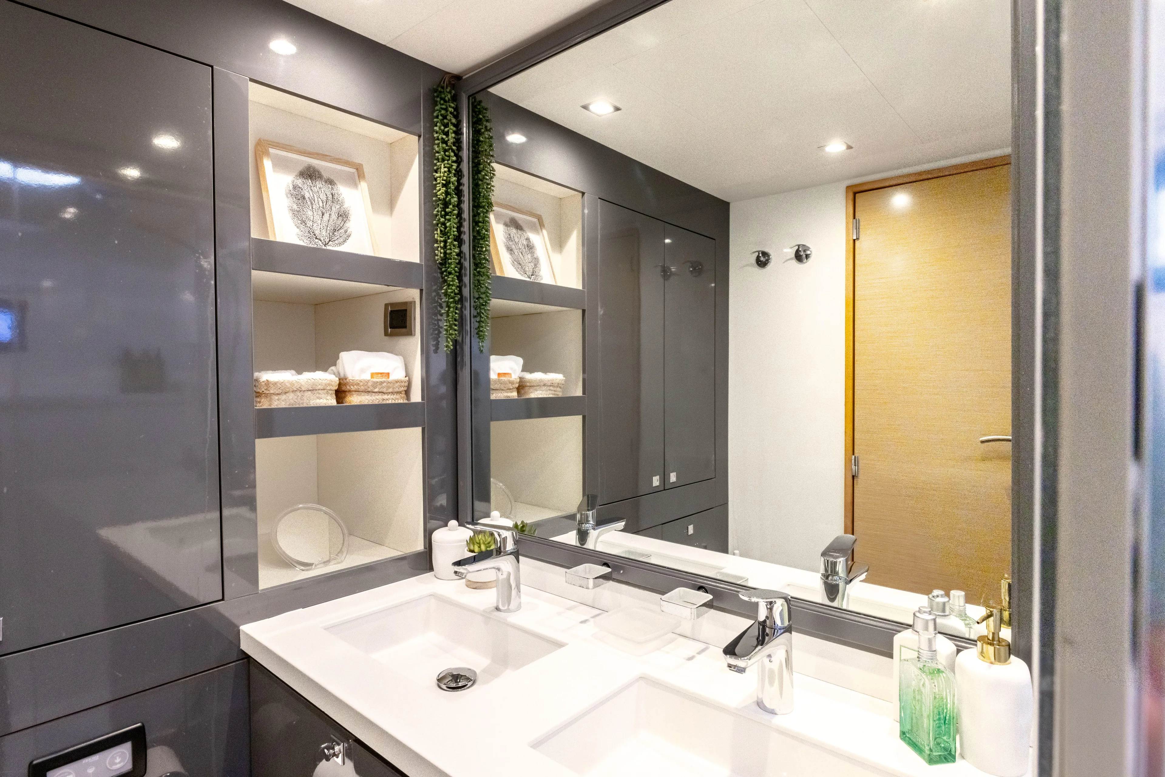  Yacht Photos Pics Luxurious bathroom interior of 2017 Fountaine Pajot Victoria 67 yacht, featuring modern fixtures.