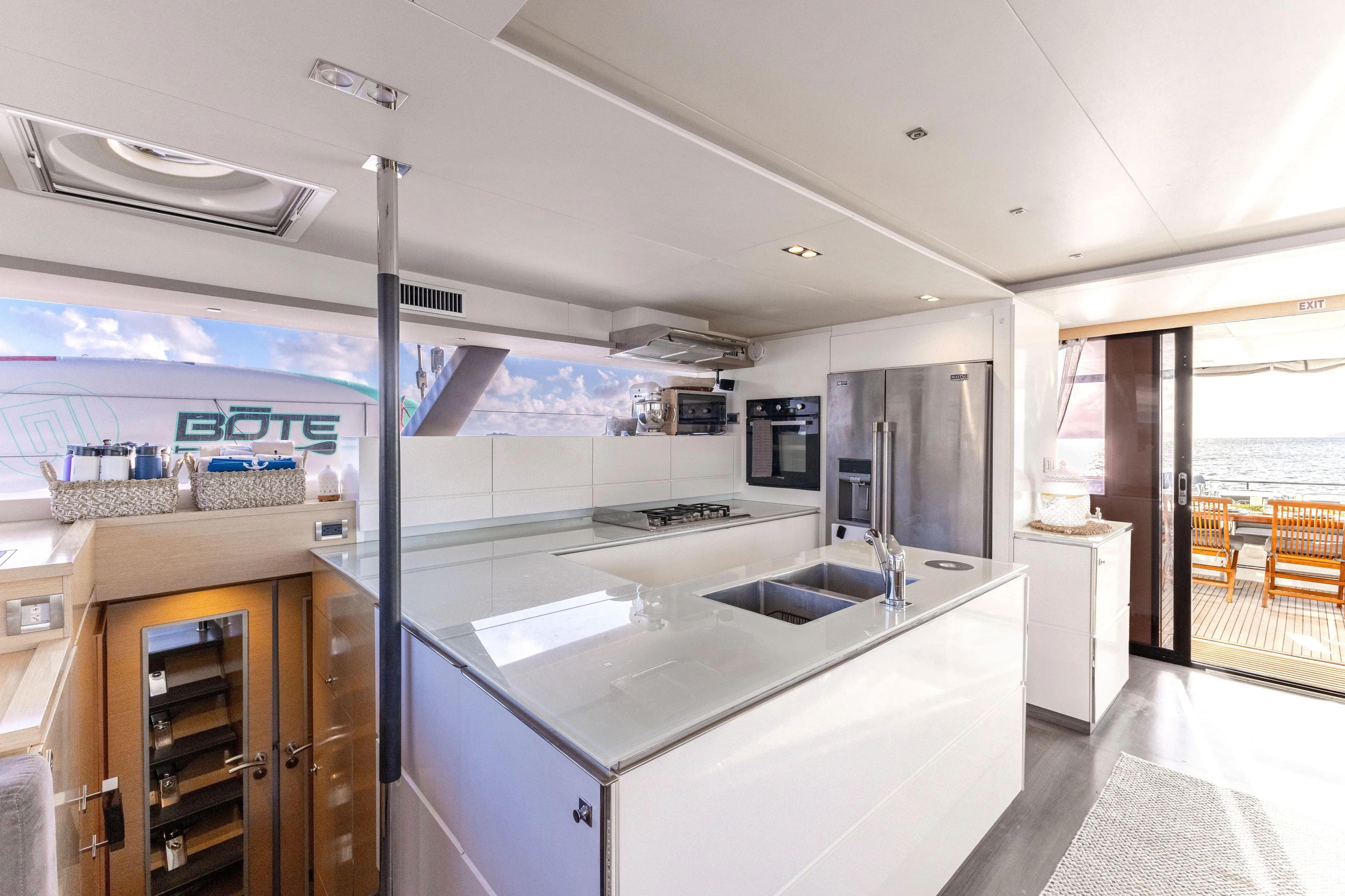  Yacht Photos Pics Luxurious kitchen interior of 2017 Fountaine Pajot Victoria 67 yacht with modern appliances.