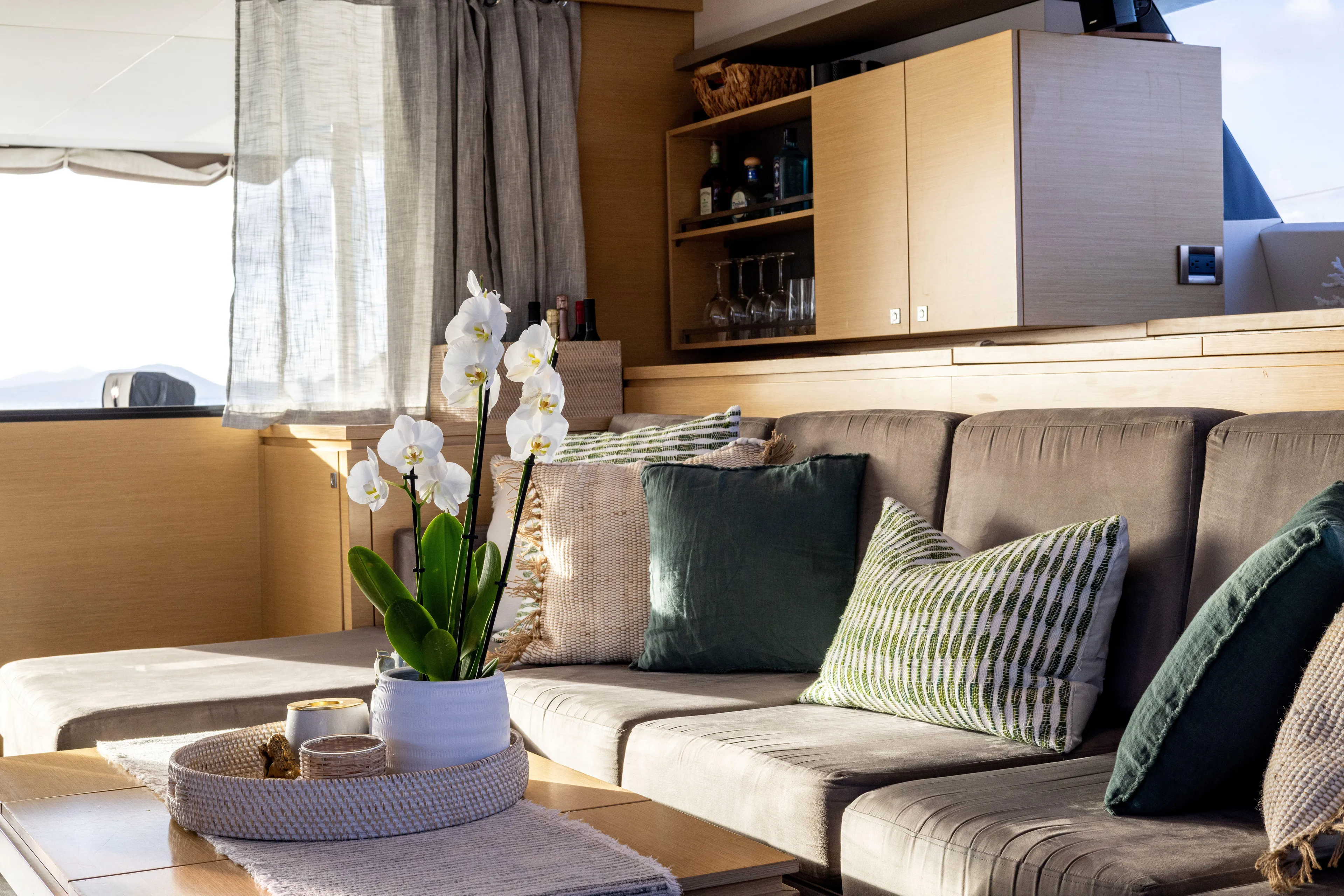  Yacht Photos Pics Luxurious interior of 2017 Fountaine Pajot Victoria 67 yacht with elegant decor and comfortable seating.