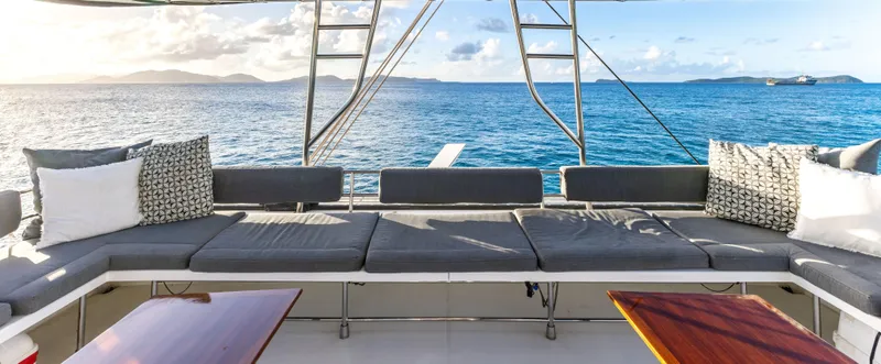  Yacht Photos Pics Luxurious 2017 Fountaine Pajot Victoria 67 yacht deck with ocean view and comfortable seating.