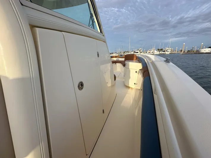 Knot Reel Serious Yacht Photos Pics 2015 Scout 320 LXF boat deck view at marina.