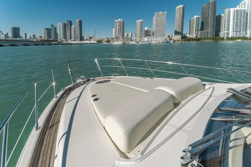 Prime Time Yacht Photos Pics 2012 Azimut 48 Flybridge yacht with city skyline in the background.