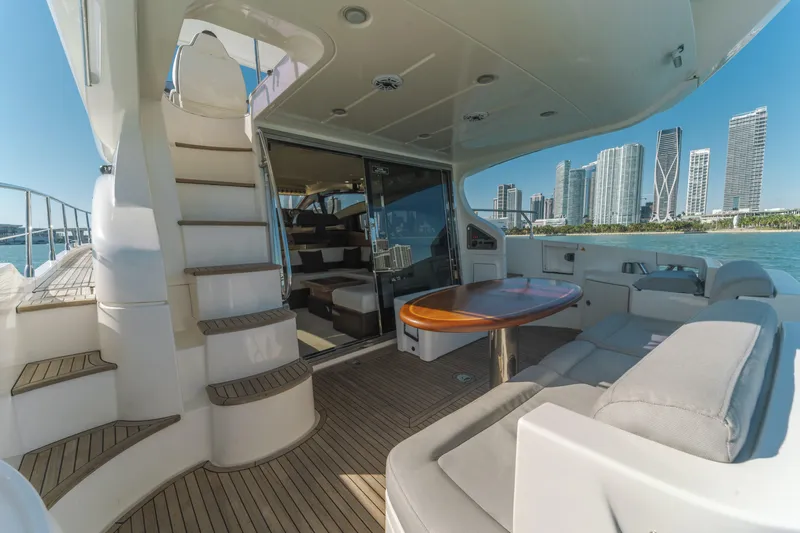 Prime Time Yacht Photos Pics Luxurious 2012 Azimut 48 Flybridge yacht interior with city skyline view.