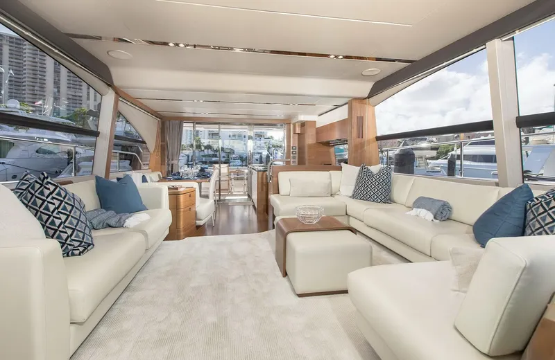 Clarity Yacht Photos Pics Luxurious interior of 2015 Princess Flybridge 68 Motor Yacht with elegant seating and decor.