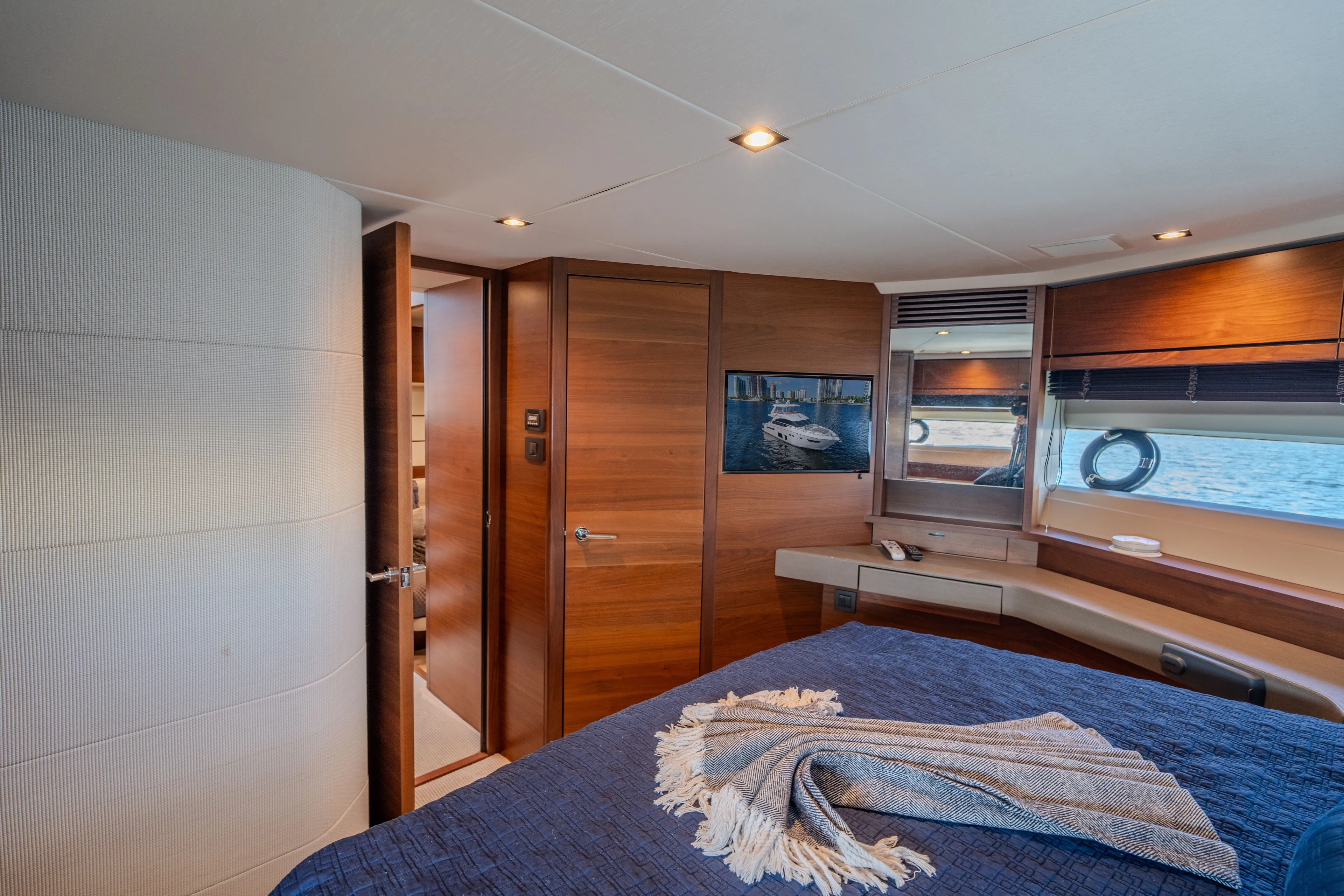 Clarity Yacht Photos Pics Luxurious bedroom on a 2015 Princess Flybridge 68 yacht.