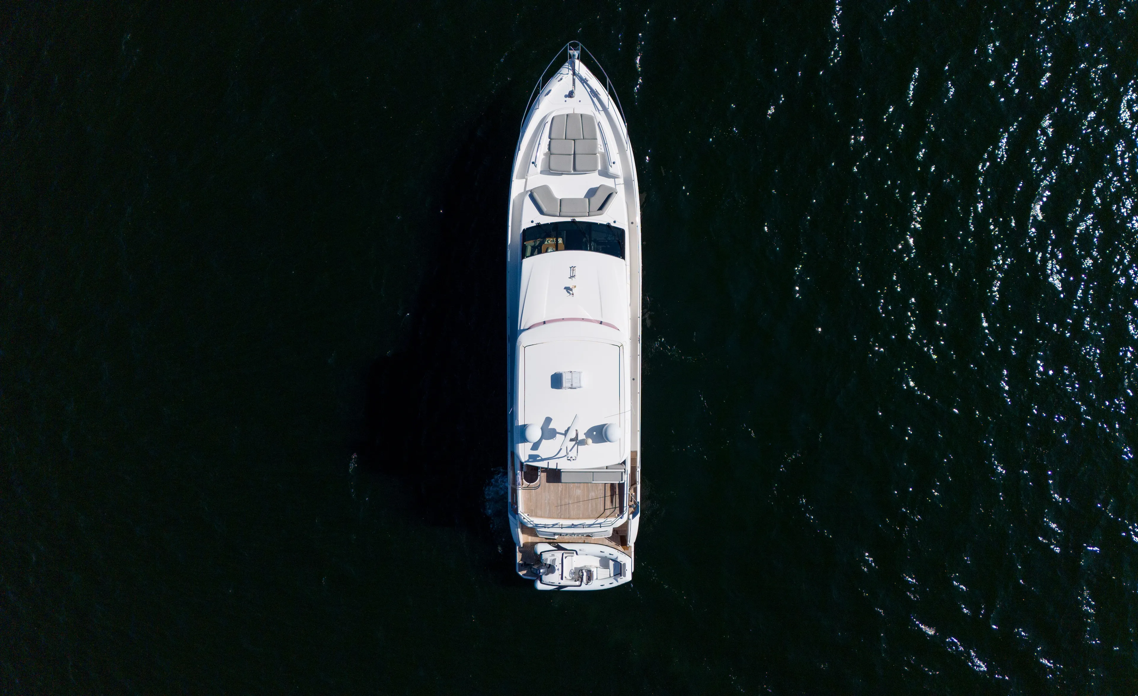 Clarity Yacht Photos Pics Aerial view of a 2015 Princess Flybridge 68 Motor Yacht on water.