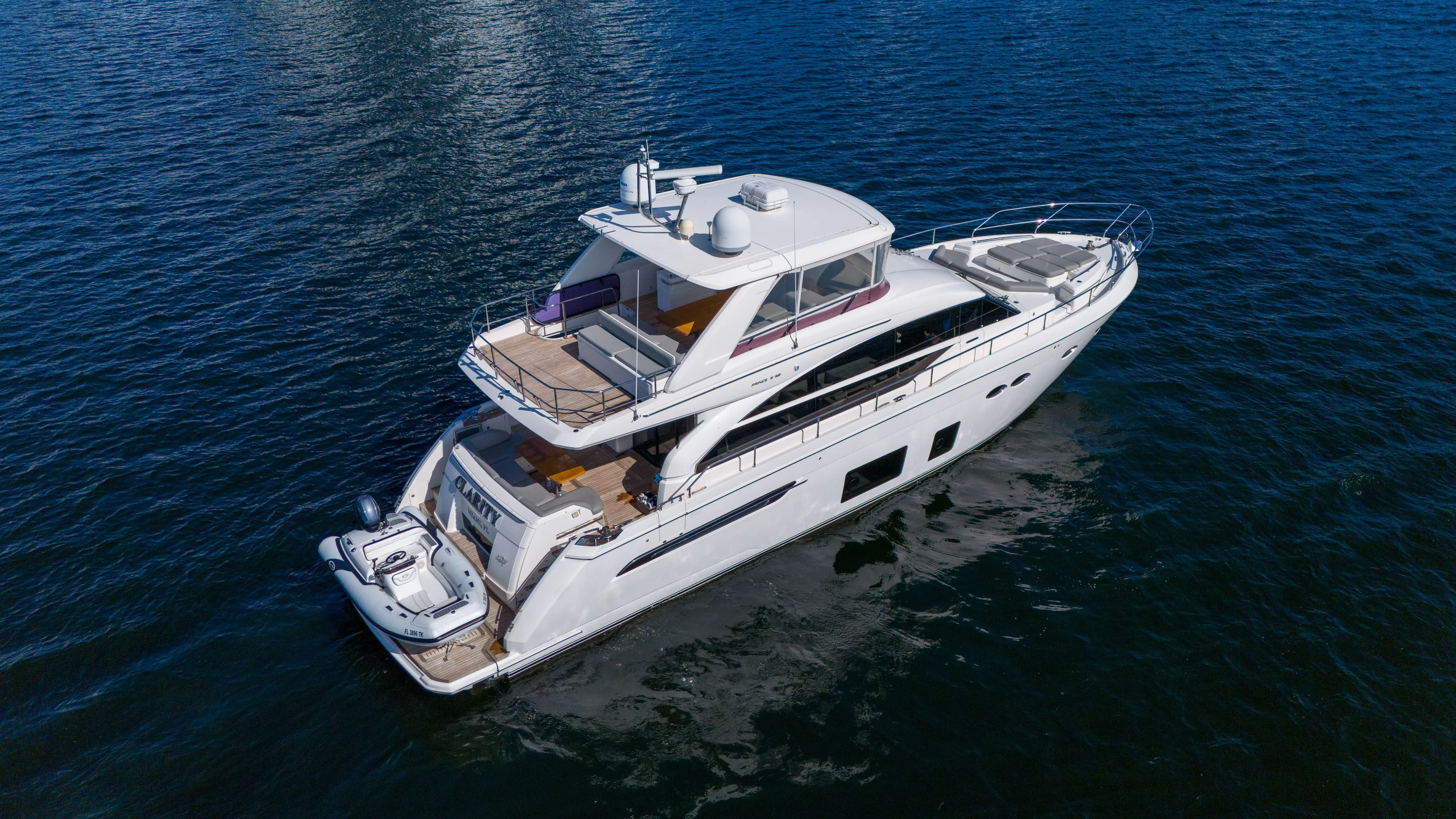 Clarity Yacht Photos Pics 2015 Princess Flybridge 68 Motor Yacht on open water.