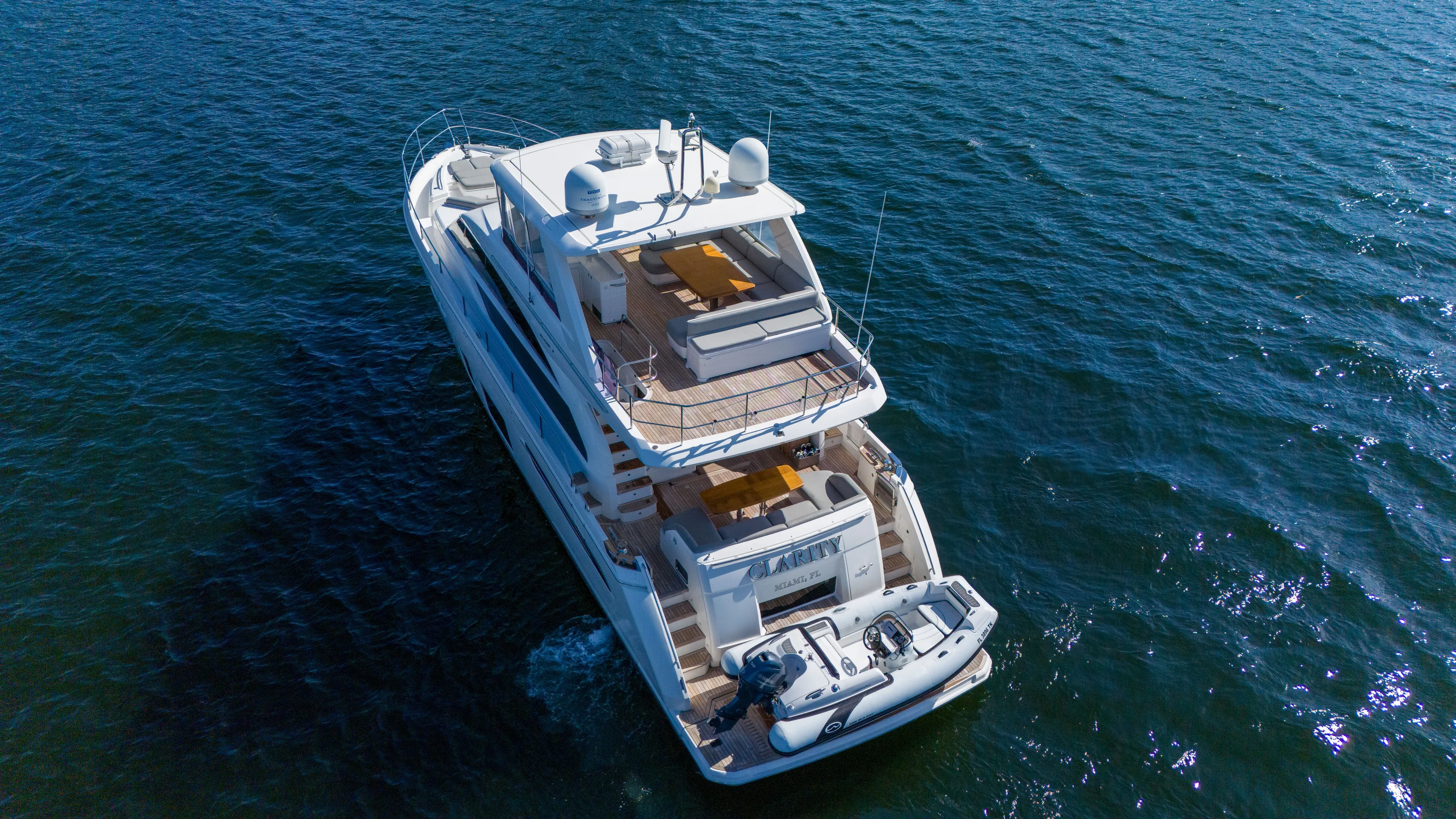 Clarity Yacht Photos Pics Aerial view of 2015 Princess Flybridge 68 Motor Yacht on water.