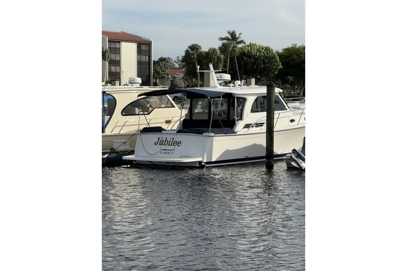 Jubilee Yacht Photos Pics 2018 Back Cove 32 boat named Jubilee docked in marina, Fort Myers, Florida.