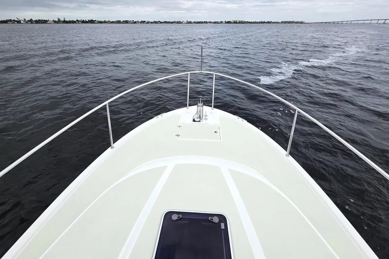 Jubilee Yacht Photos Pics Bow view of 2018 Back Cove 32 yacht cruising on open water.