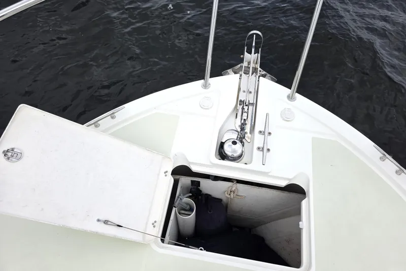 Jubilee Yacht Photos Pics Bow of 2018 Back Cove 32 boat with open storage compartment and anchor setup.