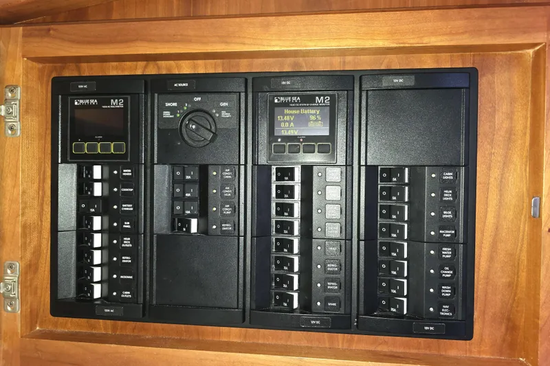 Jubilee Yacht Photos Pics Electrical panel of a 2018 Back Cove 32 boat, featuring Blue Sea Systems components.