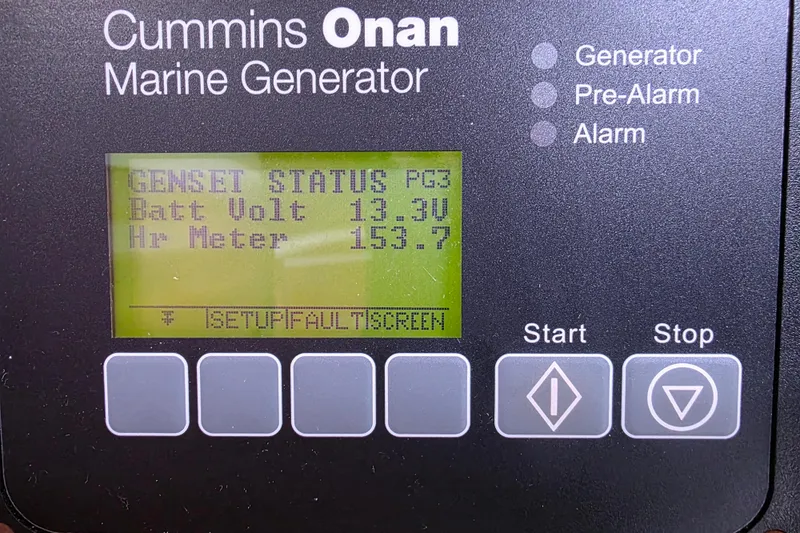 Jubilee Yacht Photos Pics Cummins Onan marine generator display showing battery voltage and hour meter on a 2018 Back Cove 32.