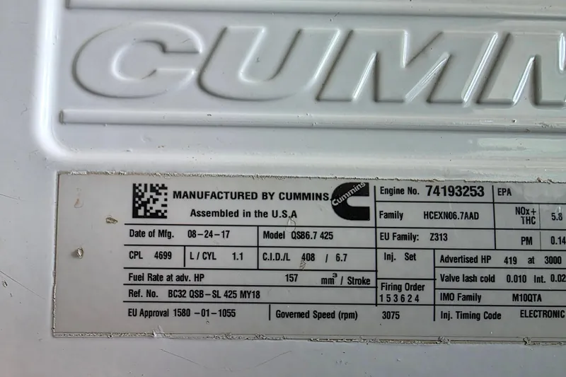 Jubilee Yacht Photos Pics Cummins engine label on 2018 Back Cove 32, detailing specifications and manufacturing information.