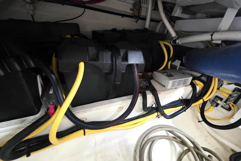 Jubilee Yacht Photos Pics Engine compartment of 2018 Back Cove 32 boat with wiring and battery setup.
