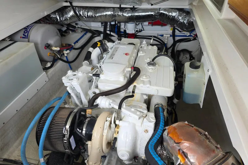 Jubilee Yacht Photos Pics Engine compartment of a 2018 Back Cove 32 boat, showcasing detailed mechanical components.