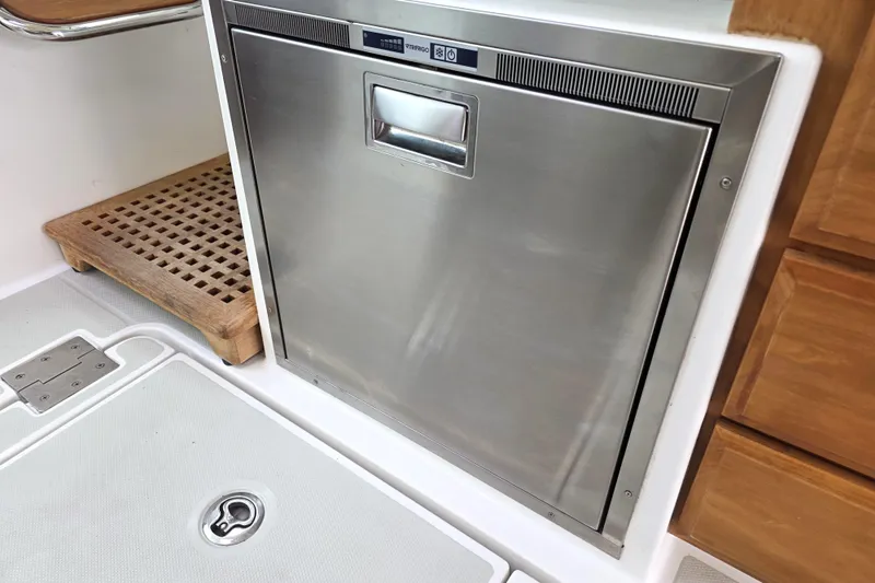 Jubilee Yacht Photos Pics Stainless steel fridge on 2018 Back Cove 32 boat interior.