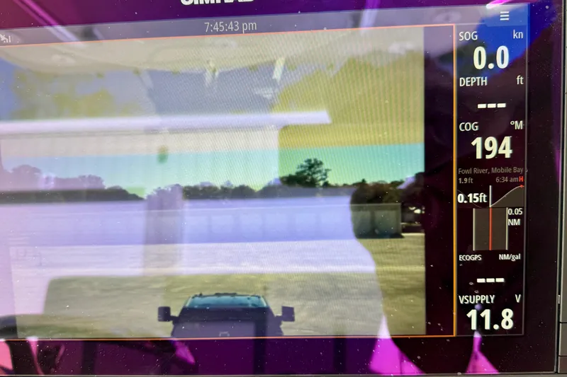  Yacht Photos Pics Boat navigation display on 2014 Invincible 36 Open Fisherman, showing course and speed data.