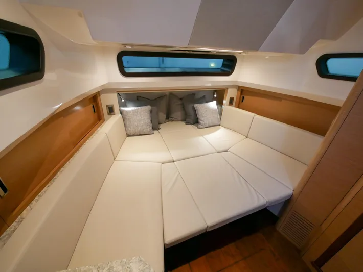 Low Hours Yacht Photos Pics Interior of 2020 Ocean Alexander 45 Divergence Sport yacht with luxurious seating area.