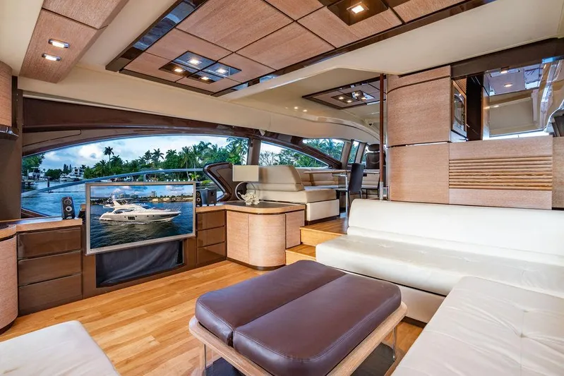 Vitamin Sea Yacht Photos Pics Luxurious interior of 2011 Azimut 70 Fly yacht with modern furnishings and scenic view.