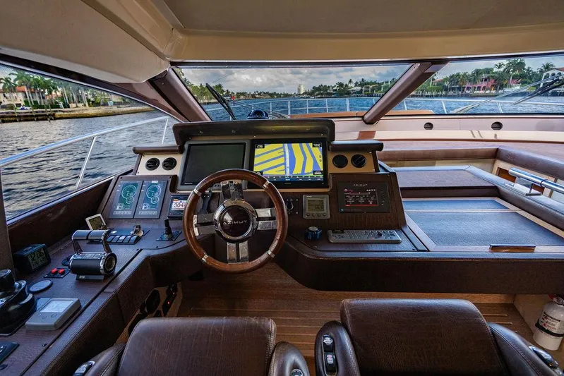 Vitamin Sea Yacht Photos Pics Cockpit of 2011 Azimut 70 Fly yacht with modern navigation equipment and luxurious design.