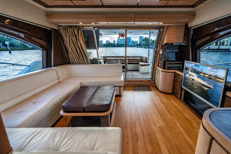Vitamin Sea Yacht Photos Pics Luxurious interior of 2011 Azimut 70 Fly yacht with city skyline view.