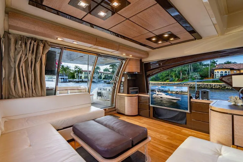 Vitamin Sea Yacht Photos Pics Luxurious interior of 2011 Azimut 70 Fly yacht with modern furnishings and scenic water view.