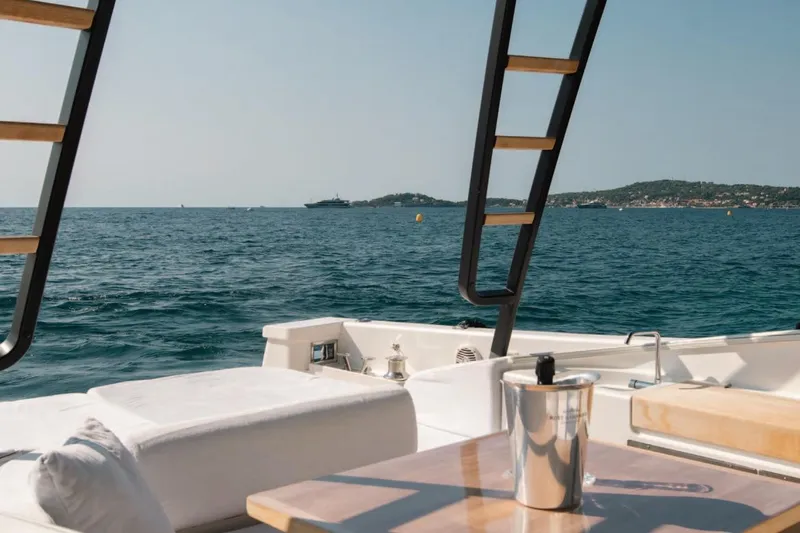  Yacht Photos Pics Luxurious 2019 Bluegame BG42 yacht deck with ocean view and elegant seating.