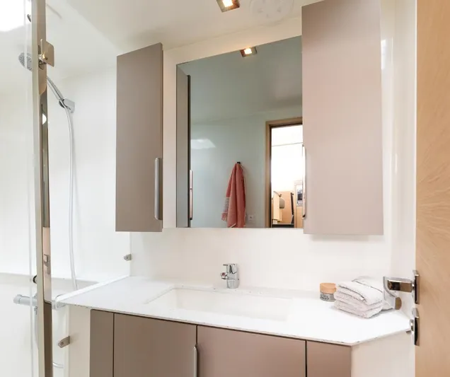 Fp41 In San Diego. Yacht Photos Pics Modern bathroom interior of 2025 Fountaine Pajot NEW 41 yacht, featuring sleek cabinetry and fixtures.