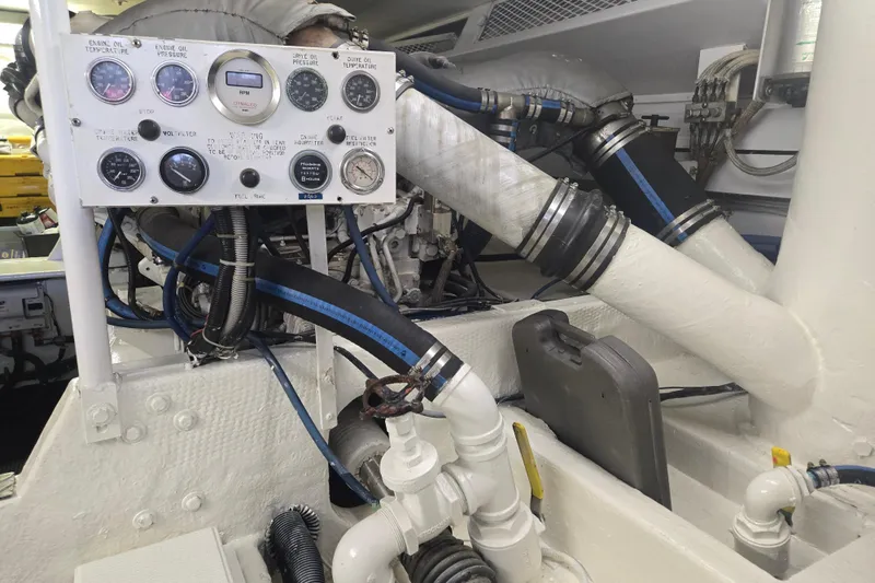 Lay A Wake Yacht Photos Pics Engine room of a 1990 Viking 53 Convertible with gauges and pipes.