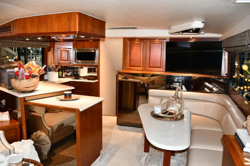 Lay A Wake Yacht Photos Pics Luxurious interior of a 1990 Viking 53 Convertible yacht with modern amenities.