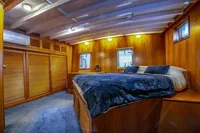Luxurious wooden cabin interior on 1987 Aberdeen Marina Complex Chinese wood junk.