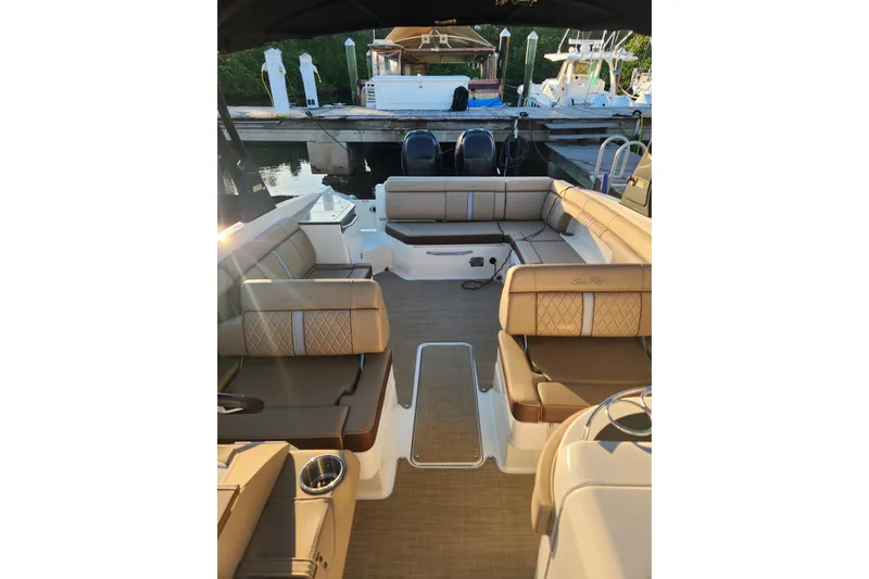  Yacht Photos Pics 2017 Sea Ray SDX 290 Outboard boat interior with luxurious seating and modern design.