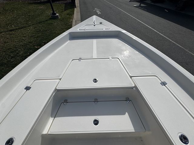 Bow view of 2025 Bulls Bay 2400 boat with storage compartments.